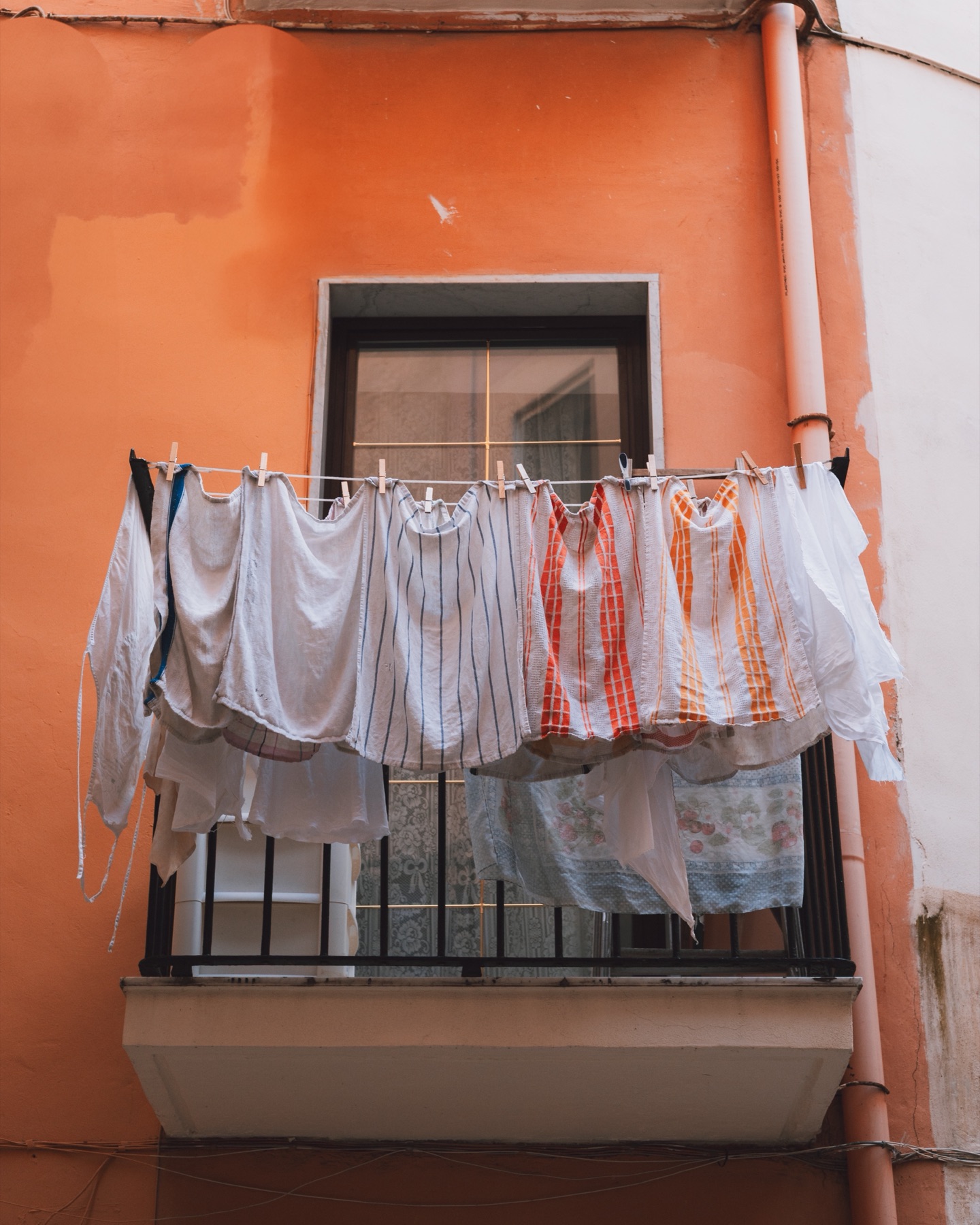 Laundry hung across a Puglia balcony, 2023